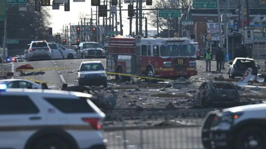 Mother and child among seven killed in Philadelphia medical jet crash