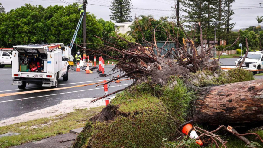 Body found in floodwaters and troops injured in Australia storm